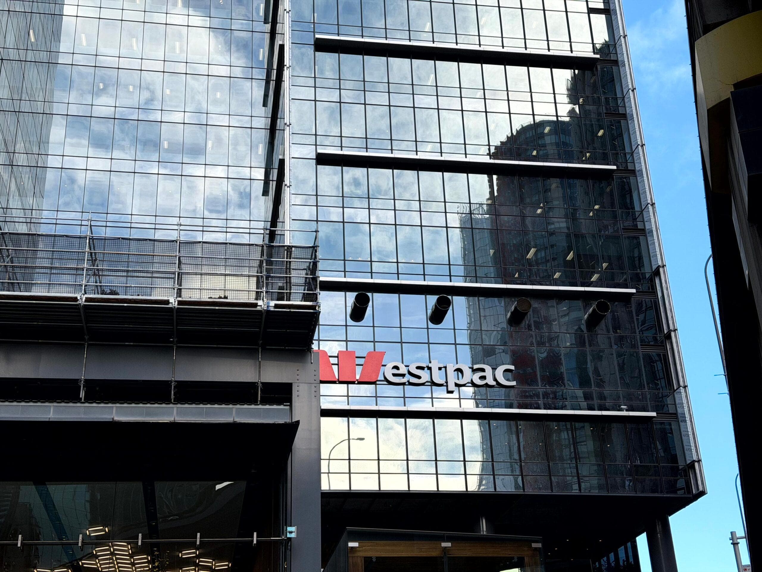 Street-level view of Westpac Place glass façade and signage during recladding