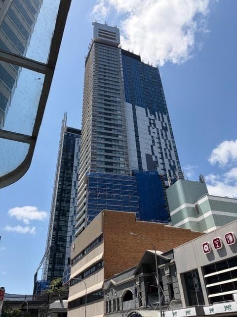 ALPOLIC™ NC/A1 installation across Metro Residences façade above transport interchange